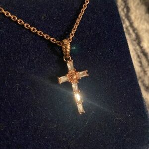 Montana silversmiths, Rose gold cross necklace lined with clear crystals